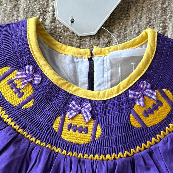NWT LIL CACTUS ~ SMOCKED FOOTBALL DRESS ~ sz.18-24mos. ~ LSU COLORS ~ BOWS - Picture 2 of 7
